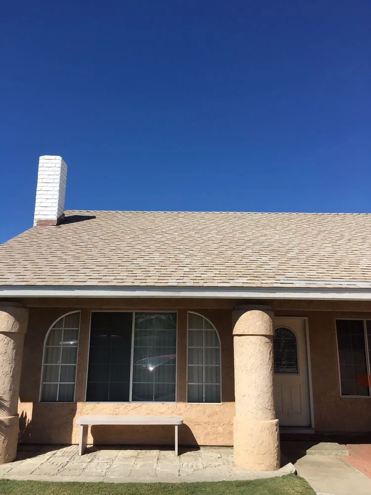 Slide of Thompson Roofing