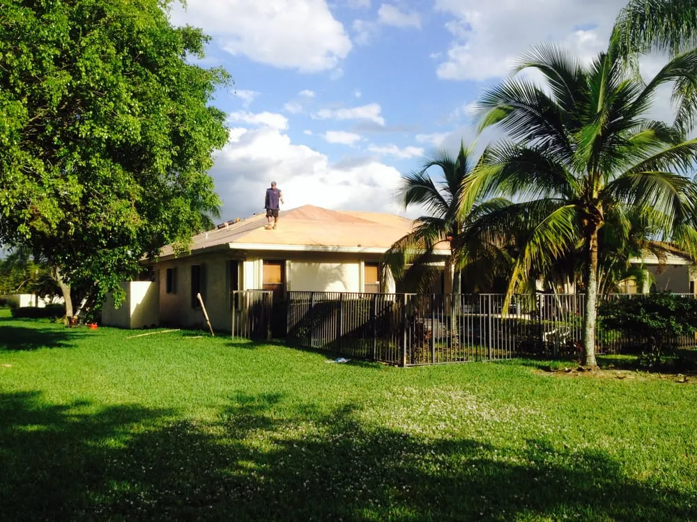 Slide of Thompsons Roofing