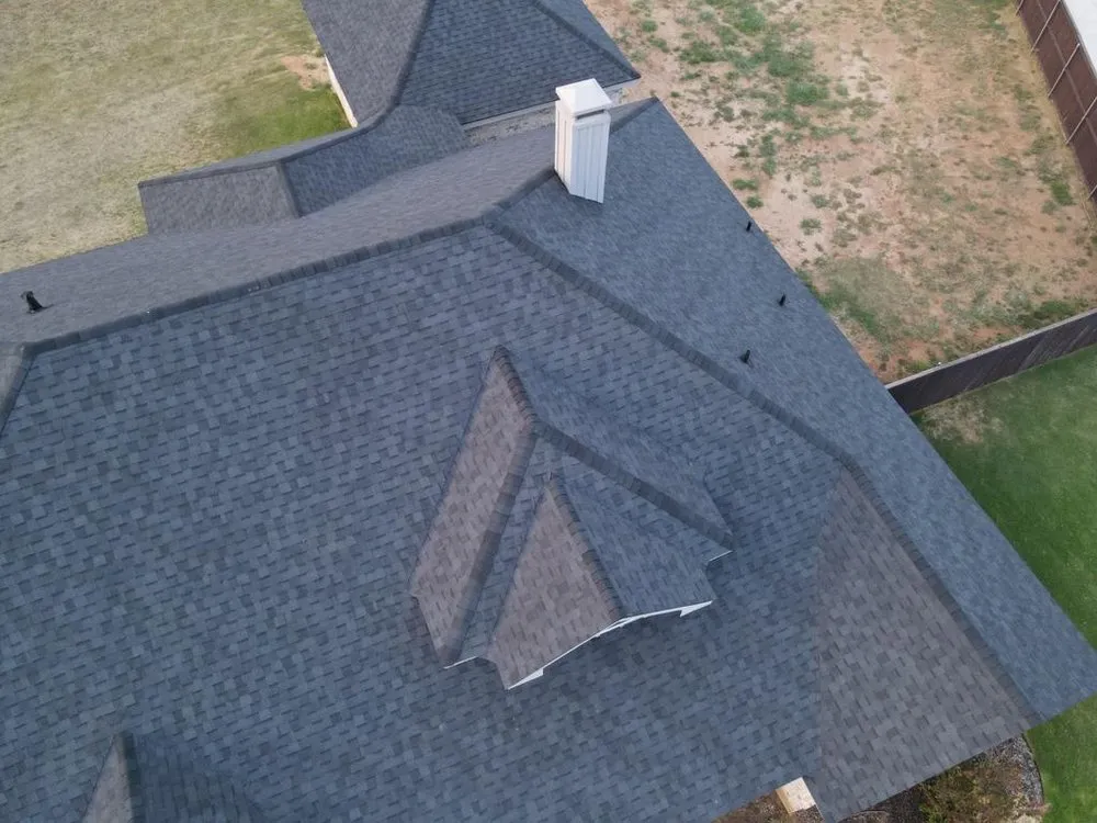 Slide of Thornton’s Roofing Company