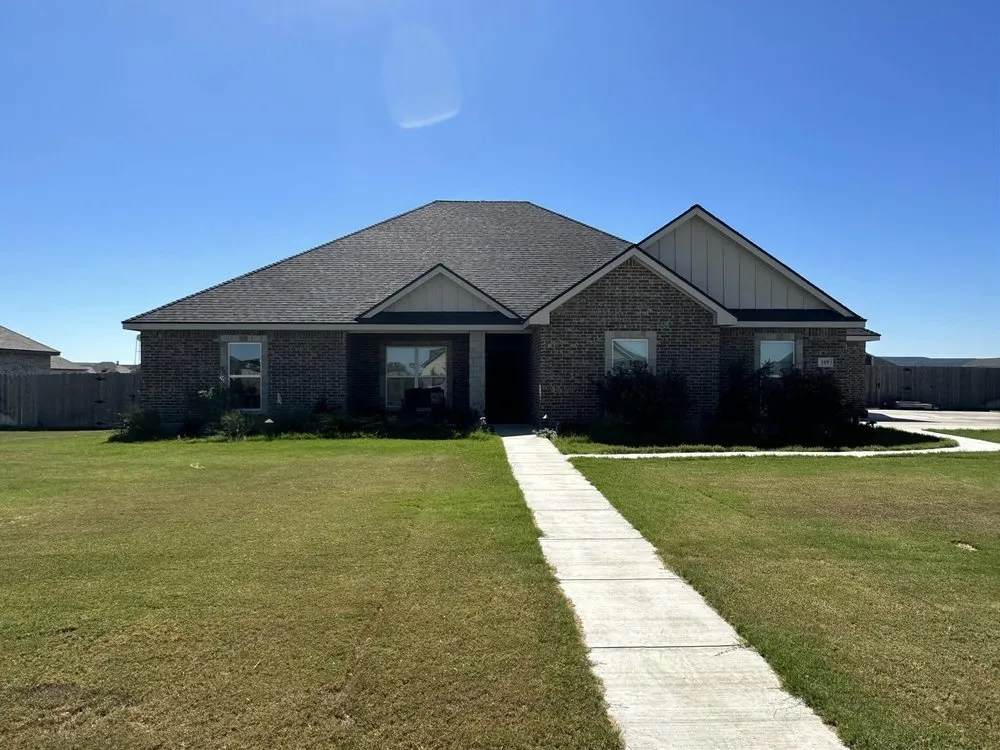 Slide of Thornton’s Roofing Company