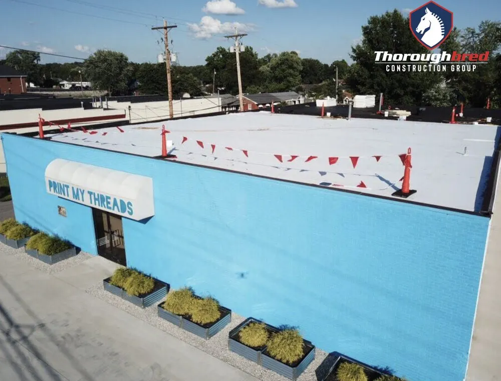 Slide of Thoroughbred Construction Group