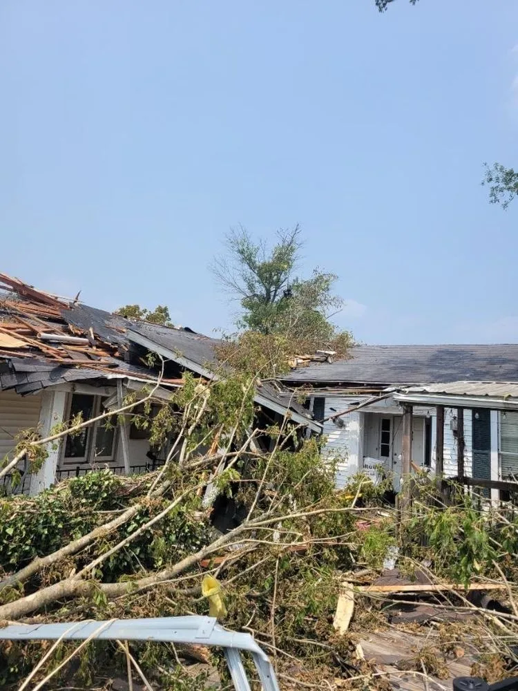 Slide of Thoroughbred Roofing & Home Design