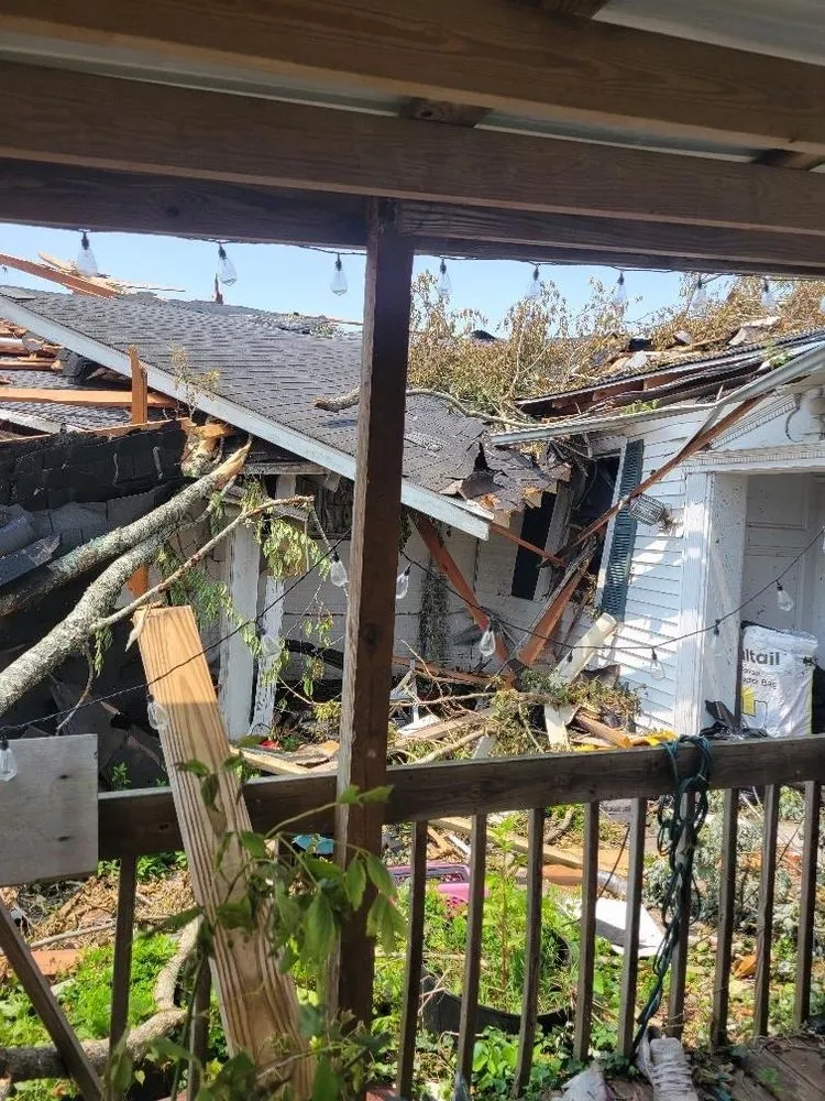 Slide of Thoroughbred Roofing & Home Design