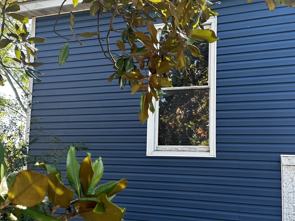 Slide of Thoroughbred Roofing & Home Design