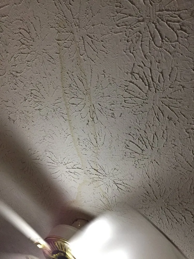 Slide of Thoroughbred Roofing & Home Design