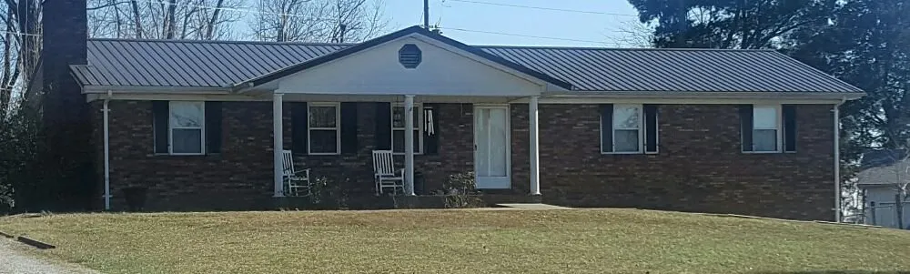 Slide of Thoroughbred Roofing & Home Design