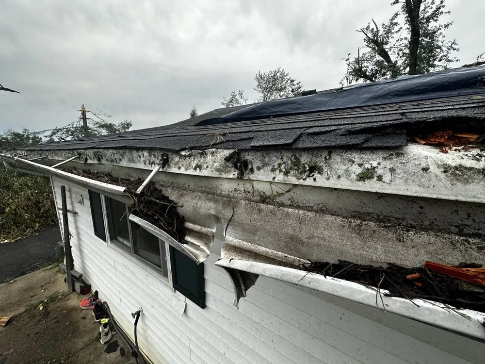 Slide of Thoroughbred Roofing & Home Design