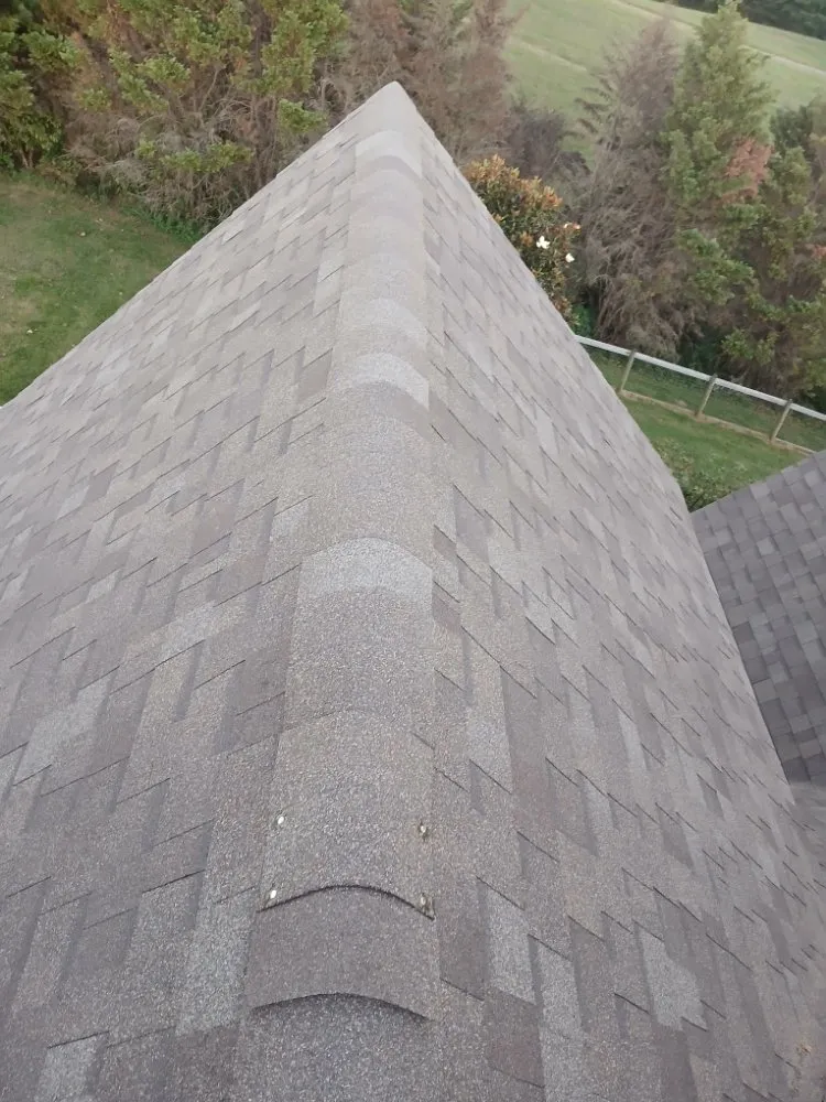 Slide of Thoroughbred Roofing