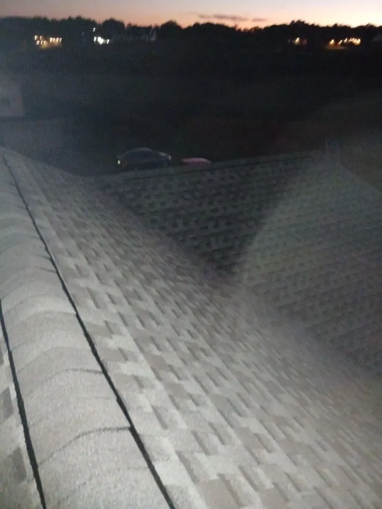 Slide of Thoroughbred Roofing