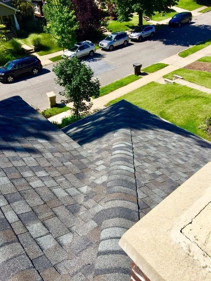 Slide of Three Amigos Roofing