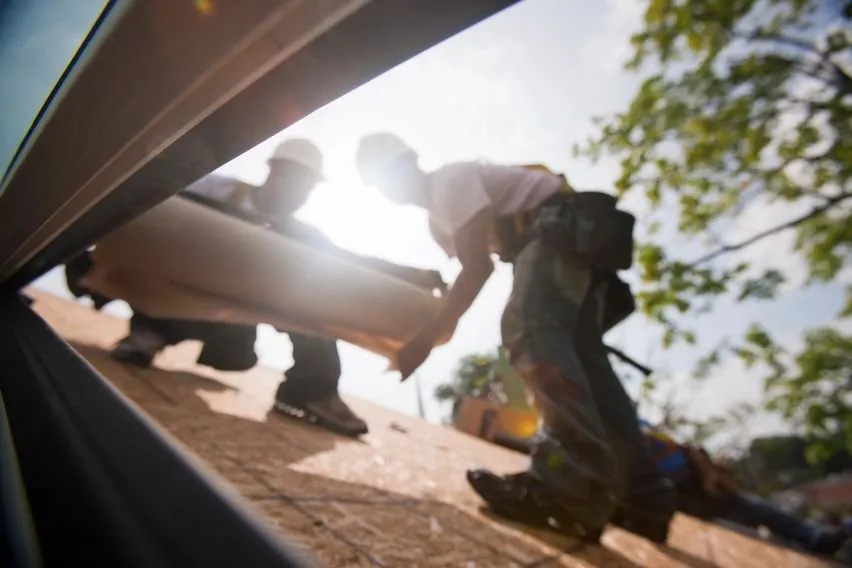Slide of Three Amigos Roofing