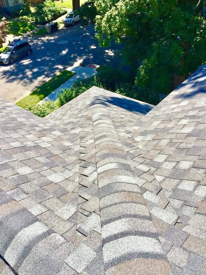 Slide of Three Amigos Roofing