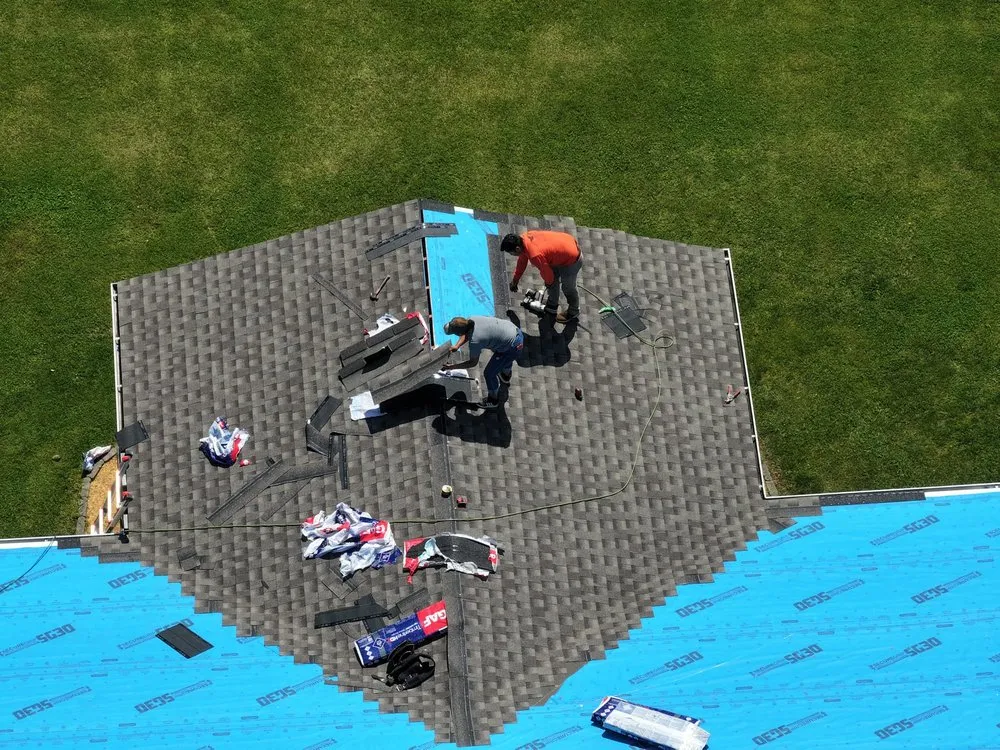 Slide of Three Brothers Roofing