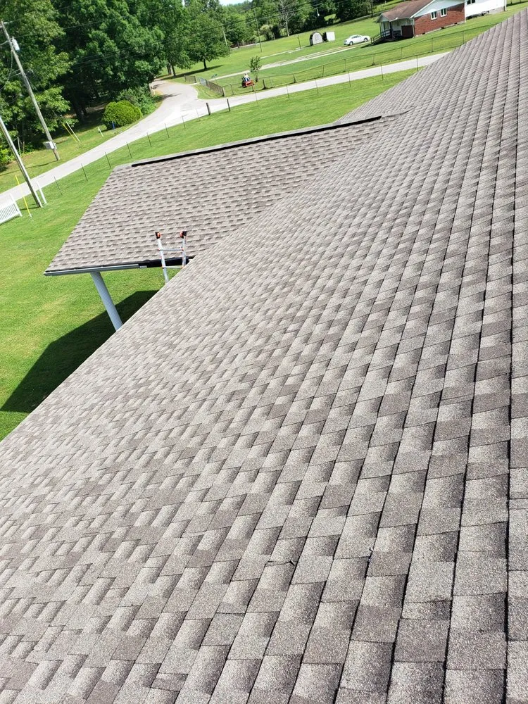 Slide of Three Brothers Roofing