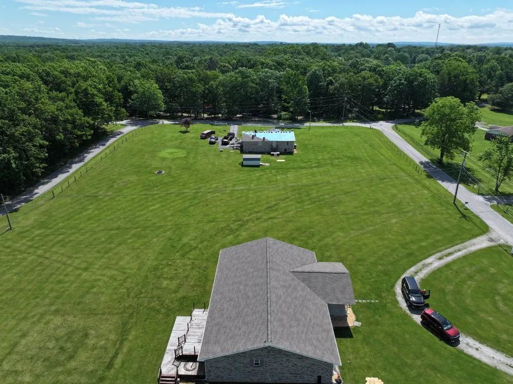 Slide of Three Brothers Roofing