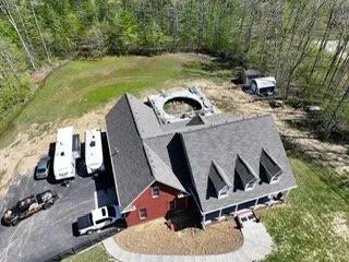 Slide of Three Brothers Roofing