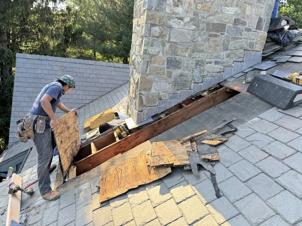 Slide of Three Brothers Roofing