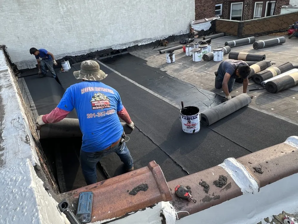 Slide of Three Brothers Roofing