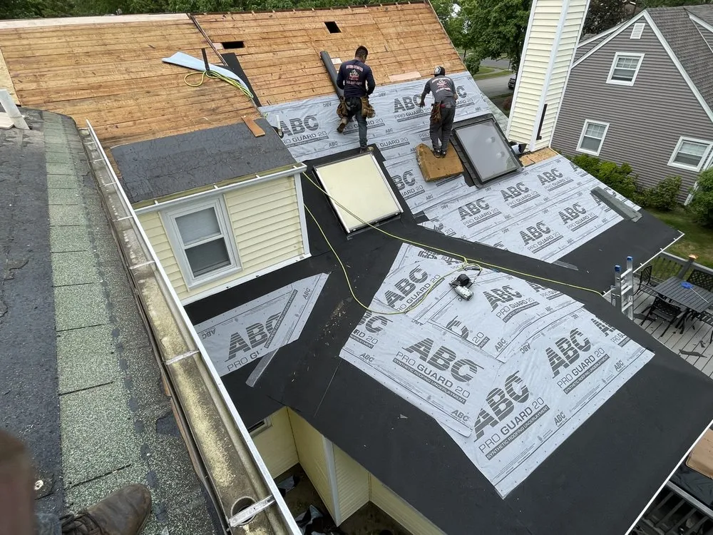 Slide of Three Brothers Roofing
