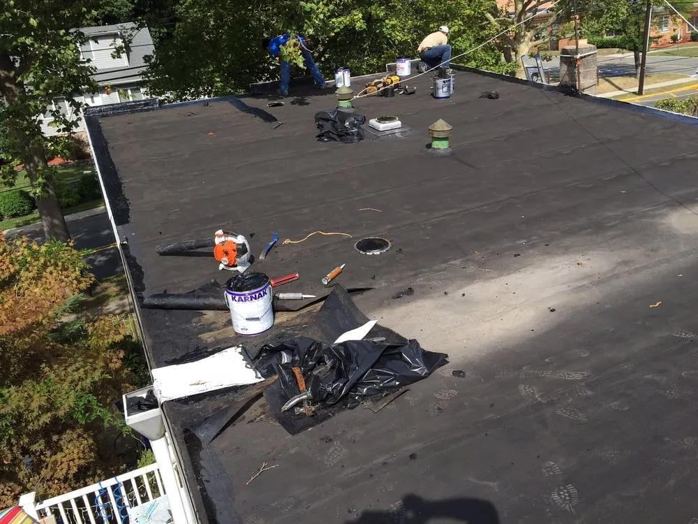 Slide of Three Brothers Roofing