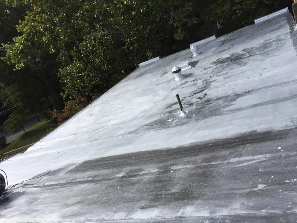 Slide of Three Brothers Roofing