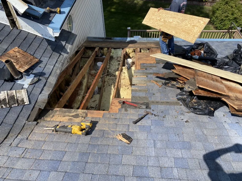 Slide of Three Brothers Roofing