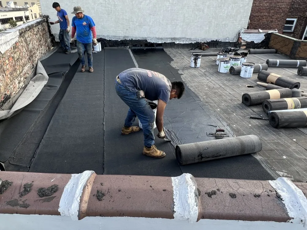 Slide of Three Brothers Roofing