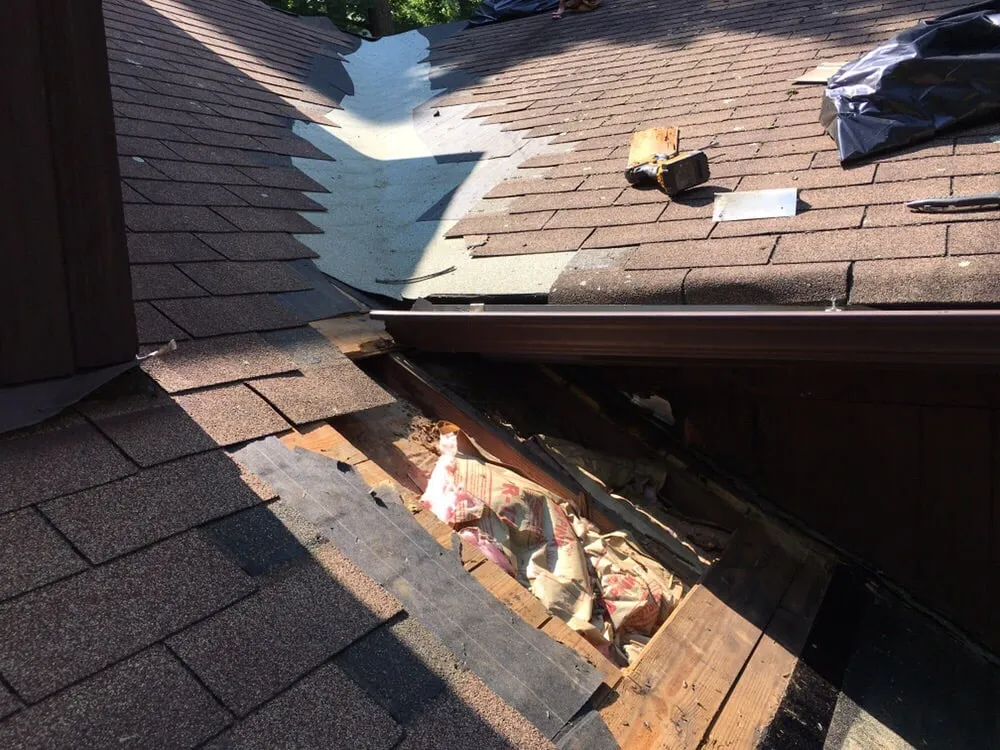 Slide of Three Brothers Roofing