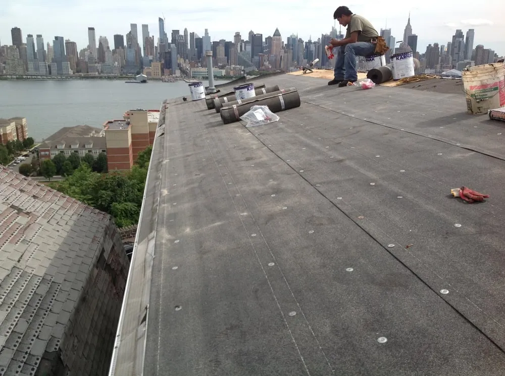 Slide of Three Brothers Roofing