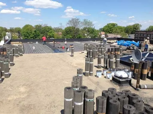 Slide of Three Brothers Roofing