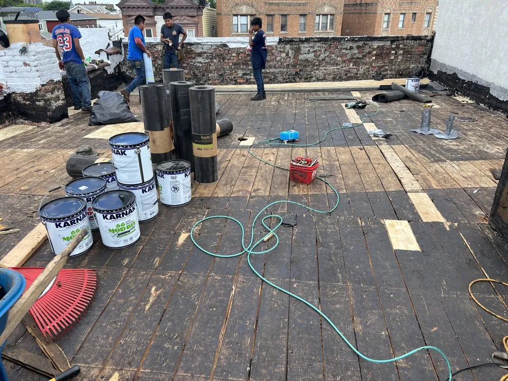 Slide of Three Brothers Roofing