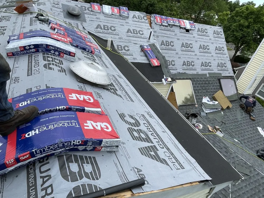 Slide of Three Brothers Roofing