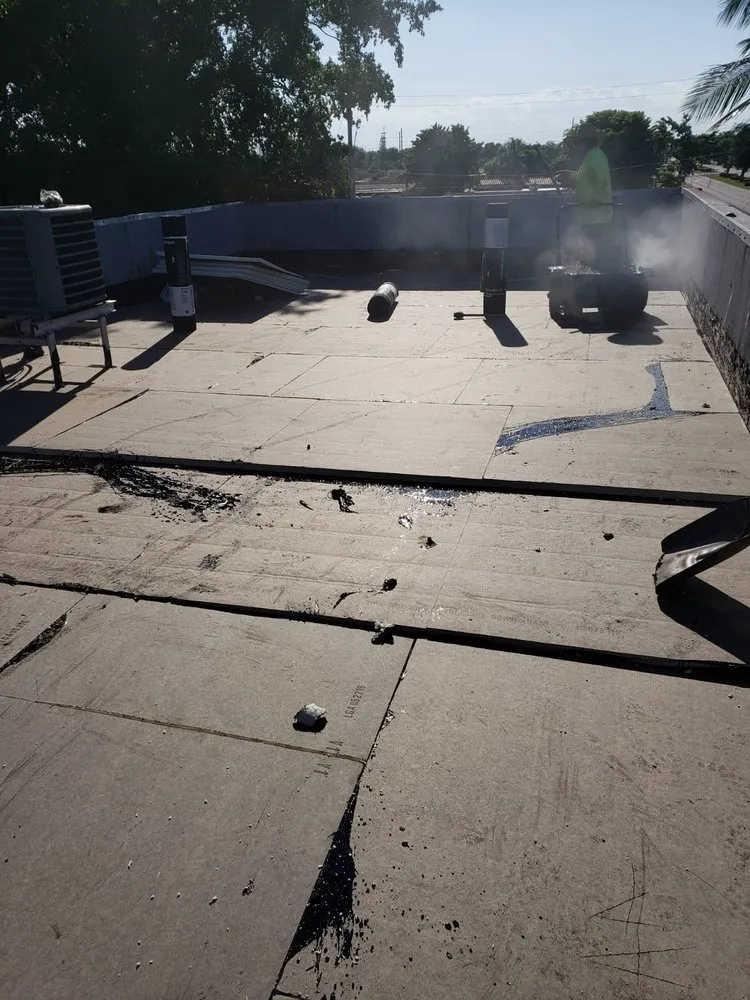 Slide of Three Brothers Roofing