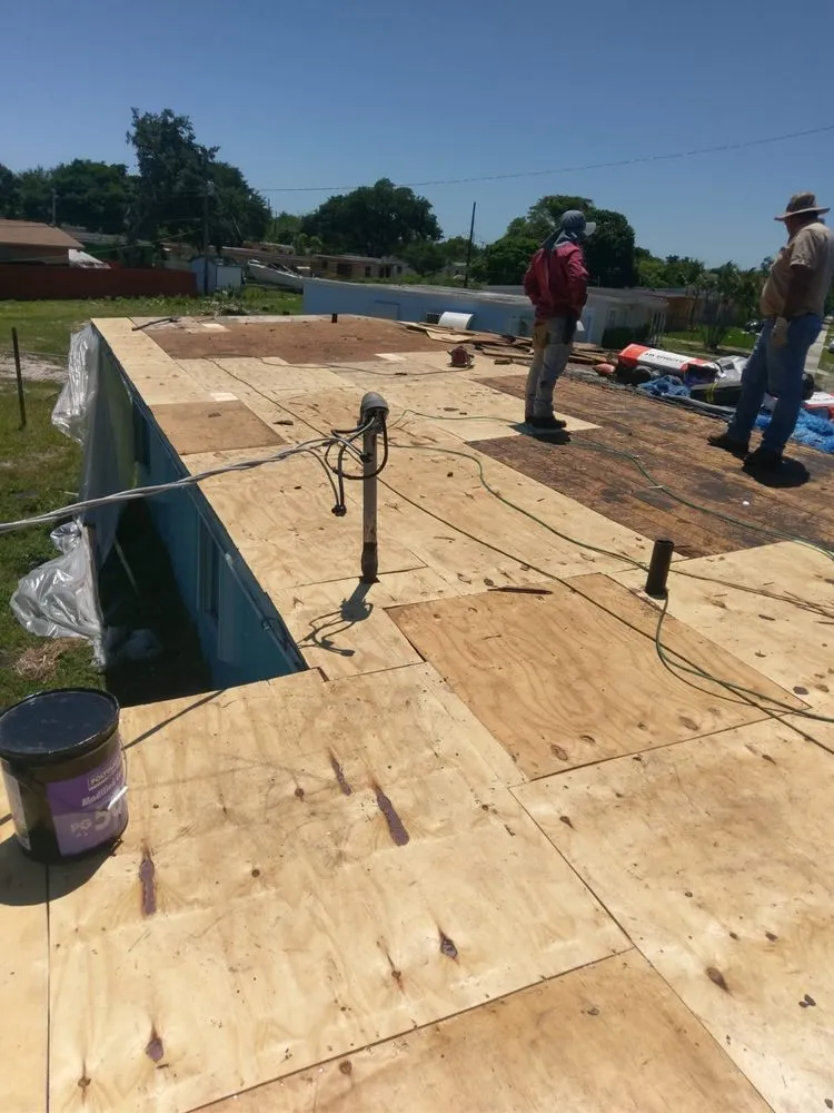 Slide of Three Brothers Roofing