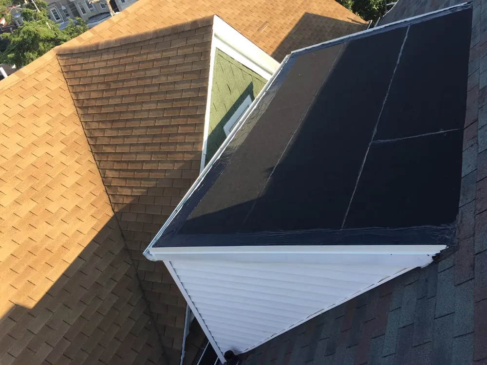 Slide of Three Brothers Roofing