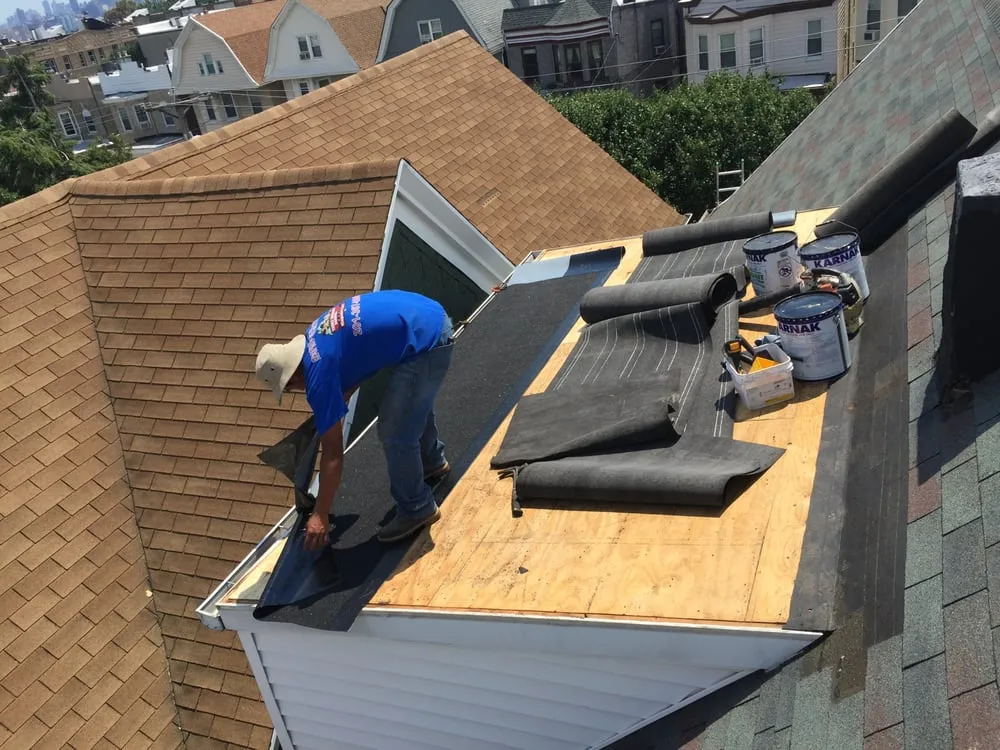 Slide of Three Brothers Roofing