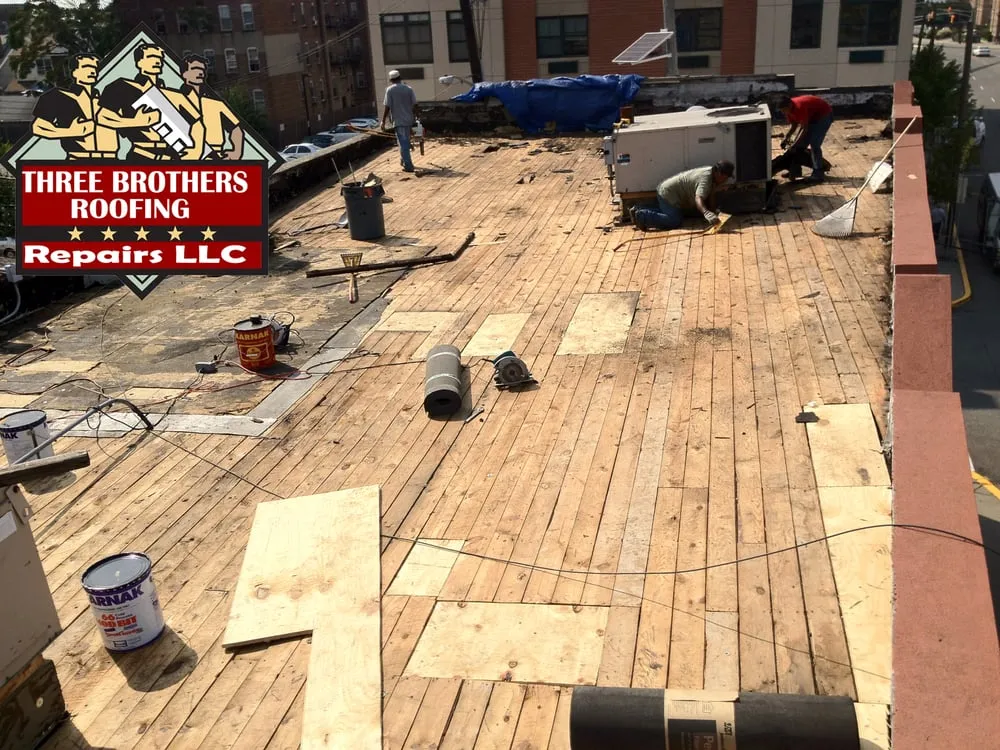 Slide of Three Brothers Roofing