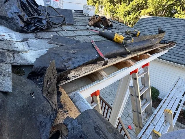 Slide of Three Brothers Roofing
