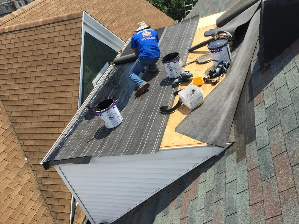 Slide of Three Brothers Roofing