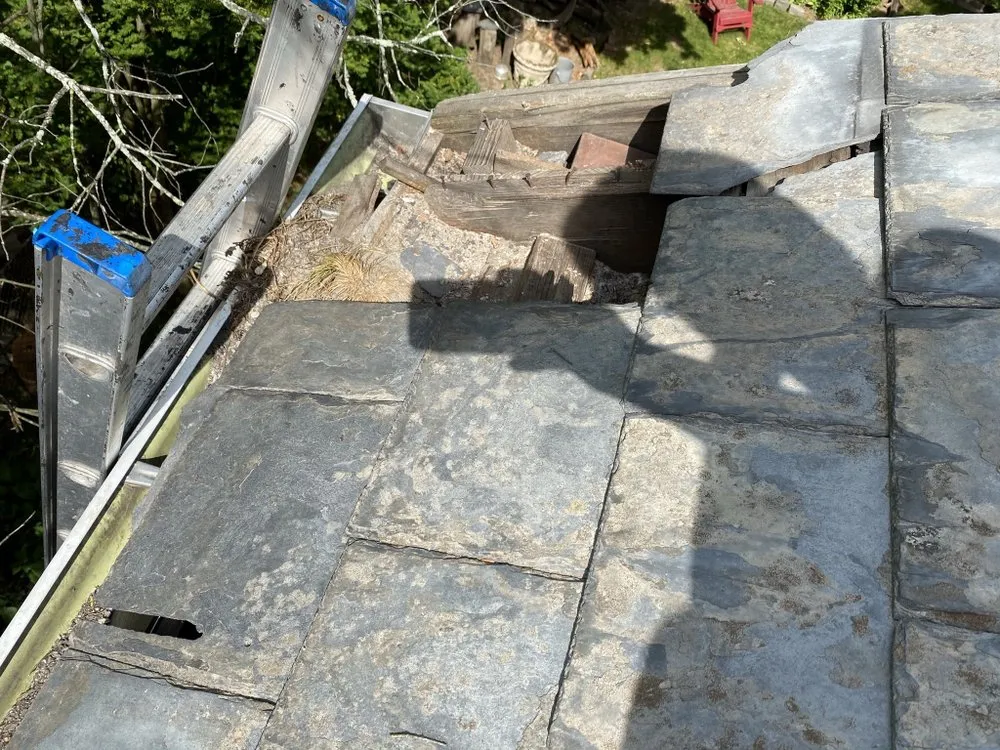 Slide of Three Brothers Roofing