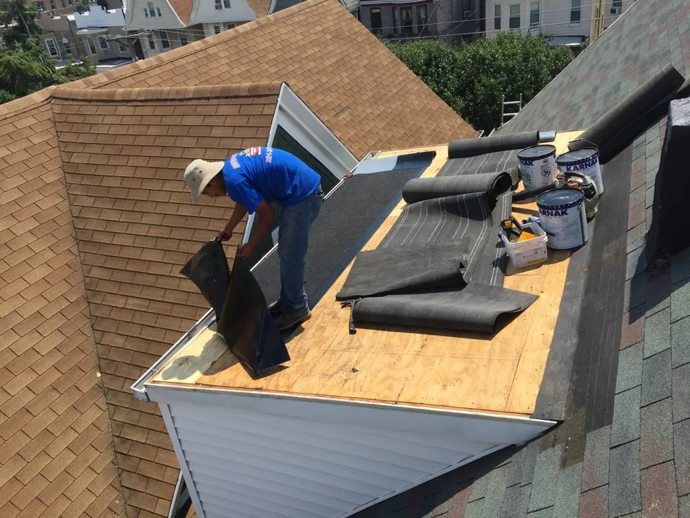 Slide of Three Brothers Roofing