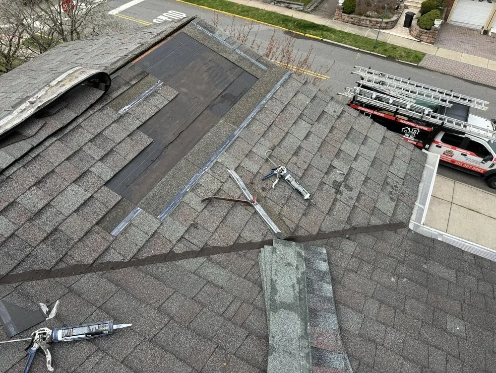 Slide of Three Brothers Roofing