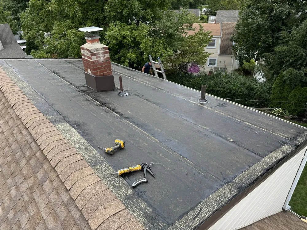 Slide of Three Brothers Roofing