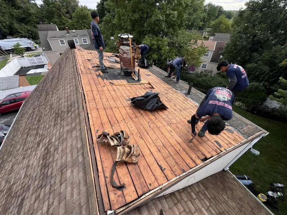Slide of Three Brothers Roofing