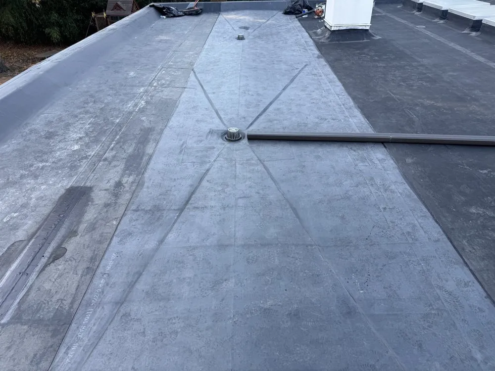 Slide of Three Brothers Roofing