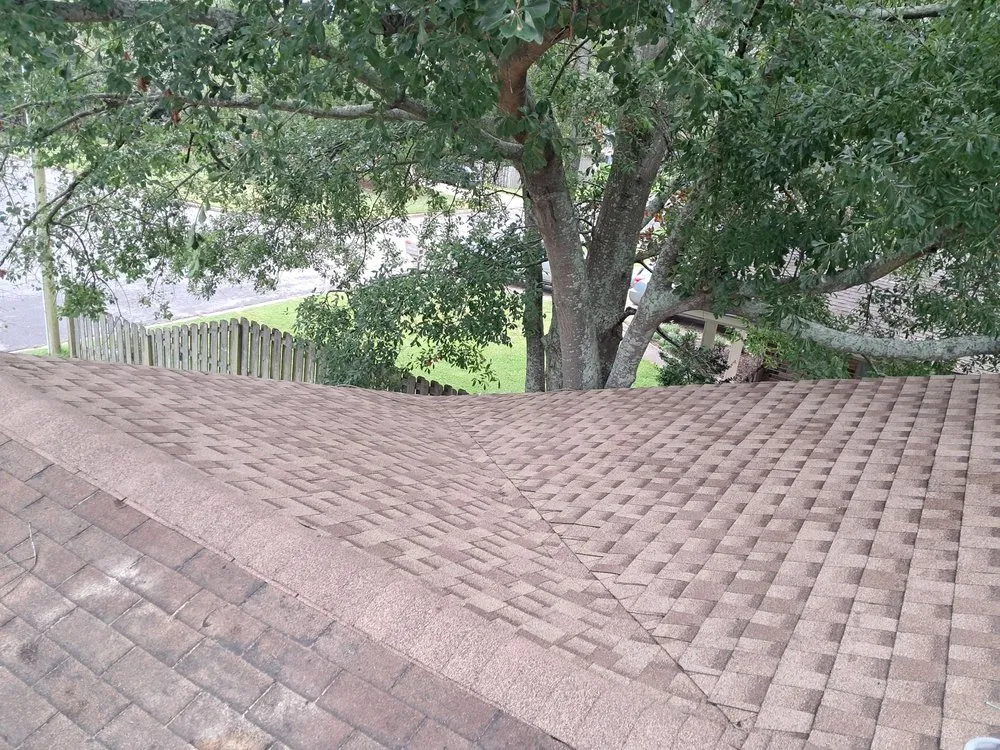 Slide of Three Brothers Roofing