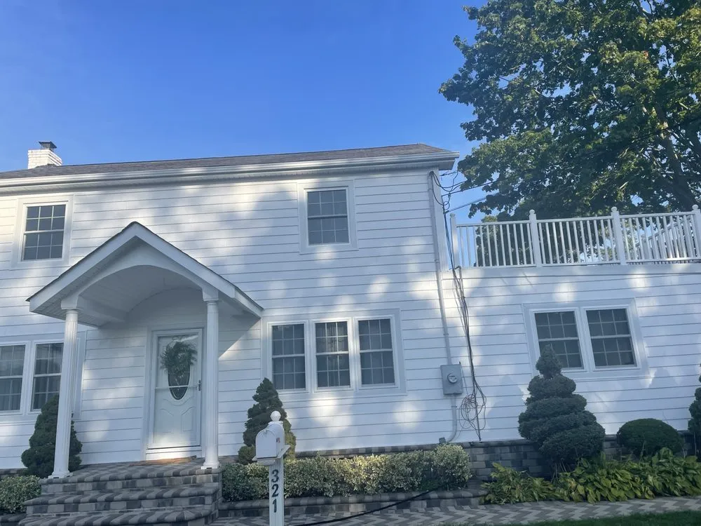 Slide of Three Brothers Seamless Gutters