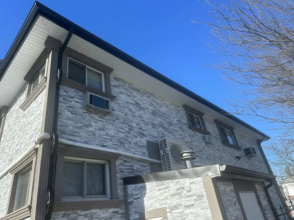 Slide of Three Brothers Seamless Gutters