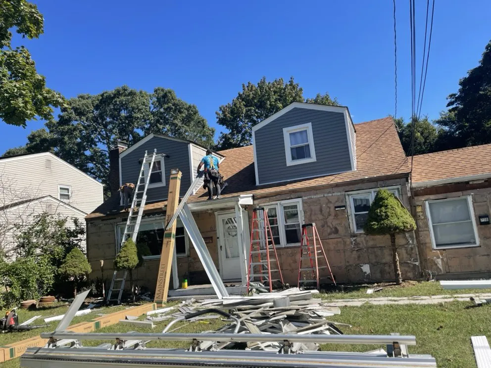 Slide of Three Brothers Seamless Gutters
