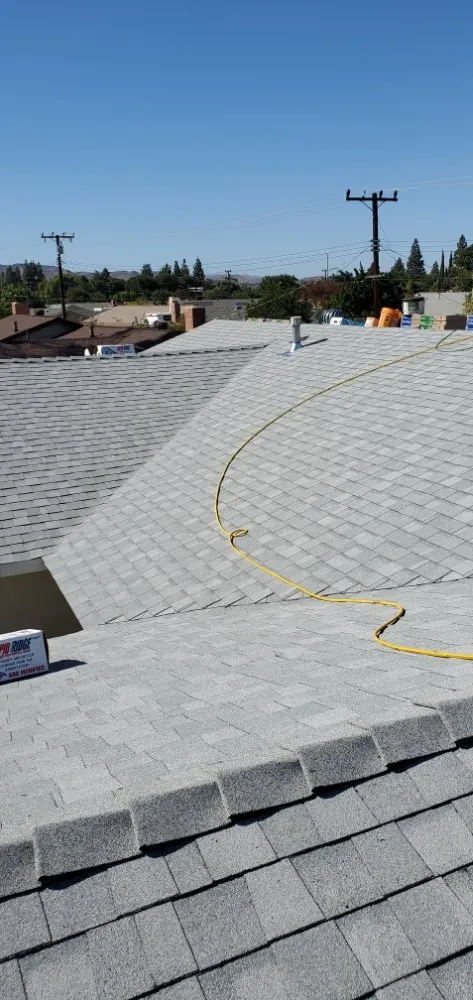 Slide of Three Clovers Roofing